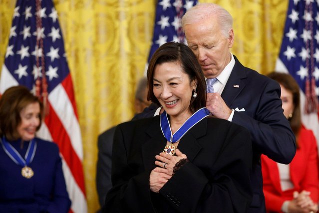 US President Joe Biden presents actress Michelle Yeoh with the Presidential Medal of Freedom, the country's highest civilian honor, during a ceremony at the White House on Friday, May 3, 2024. Biden gave the medal to 19 Americans, including high-profile political allies, celebrities and civil rights leaders. (Photo by Jonathan Ernst/UPI/Alamy Live News/AP Photo)