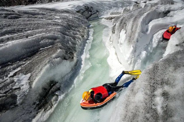 Hydrospeeding through the glacier in Switzerland. (Photo by David Carlier/Caters News)