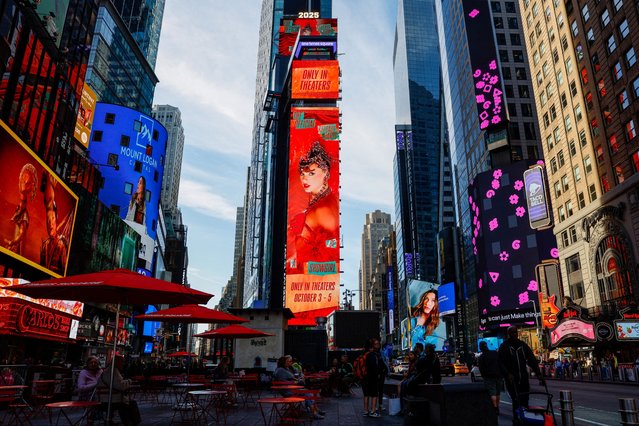 A billboard advertises “The Official Release Party of a Showgirl”, a movie celebrating Taylor Swift's new album “The Life of a Showgirl”, in Times Square, New York City, U.S., October 3, 2025. (Photo by Kylie Cooper/Reuters)