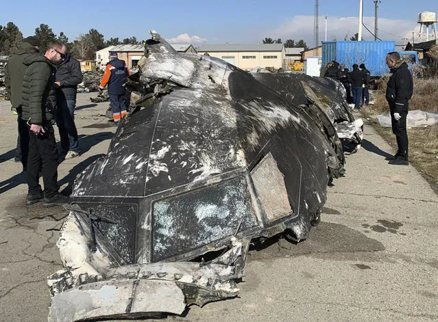 This undated photo provided by the Ukrainian Presidential Press Office, shows the wreckage of the Ukraine International Airlines Boeing 737-800 at the scene of the crash in Shahedshahr, southwest of the capital Tehran, Iran. Iran has acknowledged that its armed forces “unintentionally” shot down the Ukrainian jetliner that crashed earlier this week, killing all 176 aboard, after the government had repeatedly denied Western accusations that it was responsible. (Photo by Ukrainian Presidential Press Office via AP Photo)