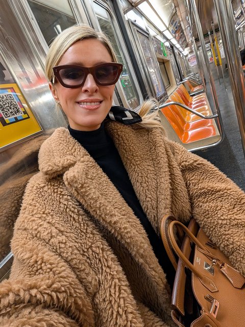 American socialite and fashion designer Nicky Hilton Rothschild – two surnames not usually associated with public transit – hops the No. 6 train for her holiday exodus in the last decade of November 2025. (Phoot by nickyhilton/Instagram)