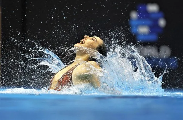 Peru's Sandy Quiroz Villaran competes in the final of the mixed duet free artistic swimming event during the World Aquatics Championships in Fukuoka on July 22, 2023. (Photo by Issei Kato/Reuters)