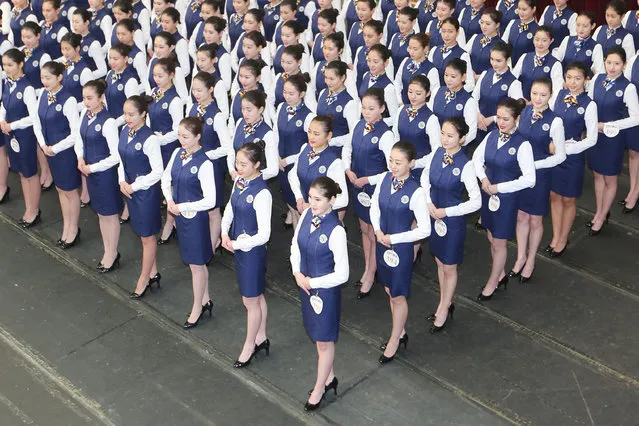 Candidates attend an audition for prospective flight attendants in Qingdao, China on December 28, 2015. (Photo by Xinhua Press/Corbis)