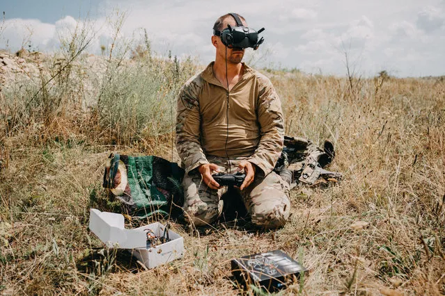 A Ukrainian soldier of the 24th Separate Mechanized Brigade, named after King Danylo, operates the test flight a new FPV drone in the training area as soldiers test their new military equipment as Russia-Ukraine war continues in Donetsk Oblast, Ukraine on August 03, 2023. (Photo by Wojciech Grzedzinski/Anadolu Agency via Getty Images)