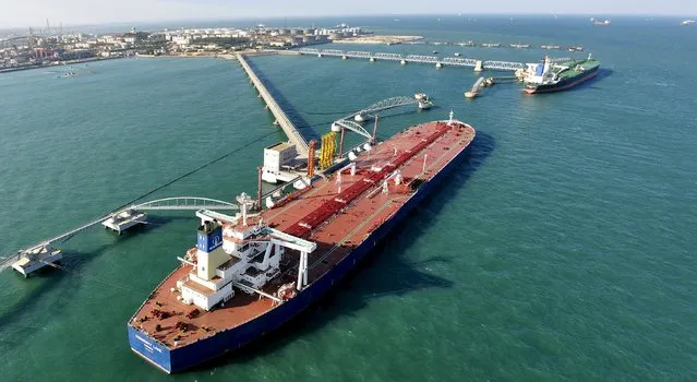 A general view of a crude oil importing port in Qingdao, Shandong province, November 9, 2008. A Chinese industry body said it could review rules covering the import of crude by new entrants after a private refinery failed to secure financing for 1.5 million barrels of crude it bought, in a blow to Beijing's moves to open up its oil market. (Photo by Reuters/Stringer)