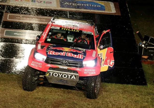 Dakar Rally, 2017 Paraguay-Bolivia-Argentina Dakar rally, 39th Dakar Edition, Departure Ceremony, Asuncion, Paraguay on January 1, 2017. Nasser Al-Attiyah and co-pilot Matthieu Baumel drive their Toyota during the symbolic start from the podium. (Photo by Jorge Adorno/Reuters)