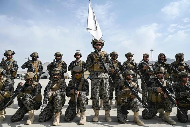 Members of the Taliban Badri 313 military unit take a position at the airport in Kabul on August 31, 2021, after the US has pulled all its troops out of the country to end a brutal 20-year war – one that started and ended with the hardline Islamist in power. (Photo by Wakil Kohsar/AFP Photo)