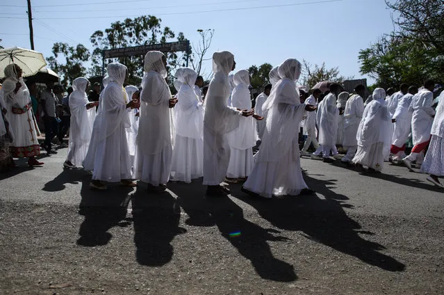 Ethiopian Orthodox worshippers take part in a procession to mark the annual Timkat epiphany celebration on January 18, 2017 in Gondar, Ethiopia. (Photo by Carl Court/Getty Images)