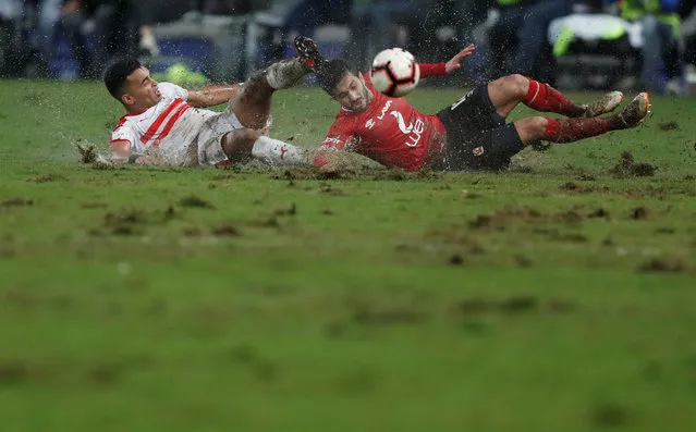 Al Ahly's Ayman Ashraf in action with El Zamalek's Youssef Obama) during the Egyptian Premier League football match between Zamalek and Al Ahly at the Borg El Arab Stadium, near Alexandria on March 30, 2019. (Photo by Amr Abdallah Dalsh/Reuters)