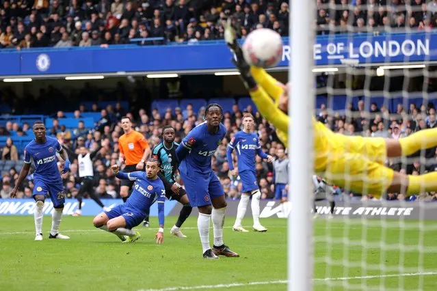 Stephy Mavididi of Leicester City scores his team's second goal past Robert Sanchez of Chelsea during the Emirates FA Cup Quarter Final between Chelsea FC and Leicester City FC at Stamford Bridge on March 17, 2024 in London, England. (Photo by Alex Pantling/Getty Images)