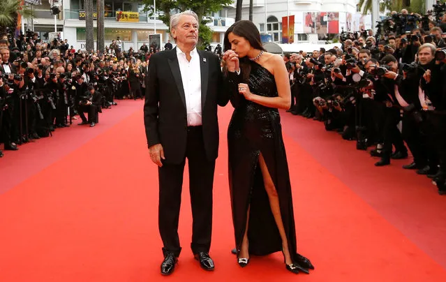 Actor Alain Delon, left, and daughter Anouchka Delon pose for photographers upon arrival at the premiere of the film “A Hidden Life” at the 72nd international film festival, Cannes, southern France, Sunday, May 19, 2019. (Photo by Stephane Mahe/Reuters)
