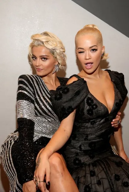 American singer Bebe Rexha (L) and British singer Rita Ora attend the 2018 American Music Awards VIP Lounge, presented by Aviation American Gin, at Microsoft Theater Gold Ballroom on October 9, 2018 in Los Angeles, California. (Photo by Jesse Grant/Getty Images for Aviation Gin)