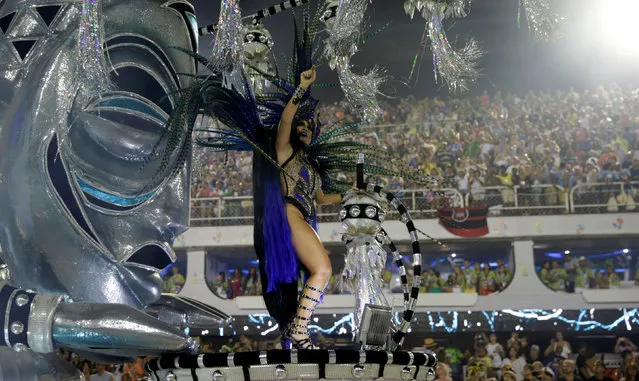 A reveller from Vila Isabel samba school performs during the carnival parade at the Sambadrome in Rio de Janeiro, Brazil February 27, 2017. (Photo by Ricardo Moraes/Reuters)