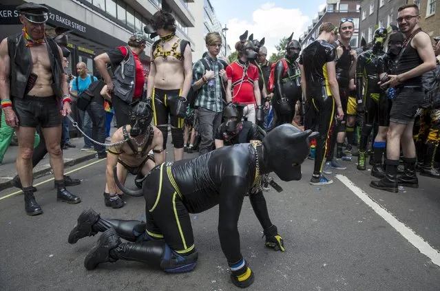 A participant wears a leather and latex costume as they take part in the annual Pride London Parade which highlights issues of the gay, lesbian and transgender community, in London, Britain June 27, 2015. (Photo by Neil Hall/Reuters)