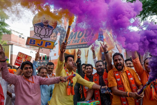 Bharatiya Janata Party (BJP) supporters celebrate outside BJP headquarters, on the day of the general election results, in New Delhi, India, on June 4, 2024. (Photo by Adnan Abidi/Reuters)