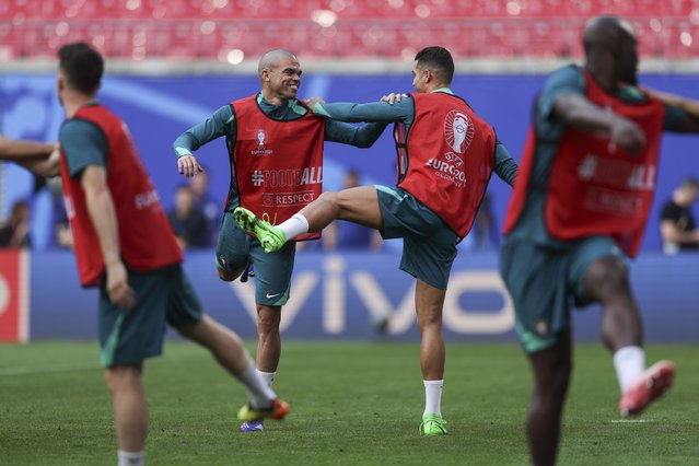 Portugal national soccer team players Pepe (L) and Cristiano Ronaldo (R) during a training session in Leipzig, Germany, 17 June 2024. The Portuguese national soccer team will face Czech Republic in a UEFA EURO 2024 Group F match on 18 June. (Photo by Miguel A. Lopes/EPA)