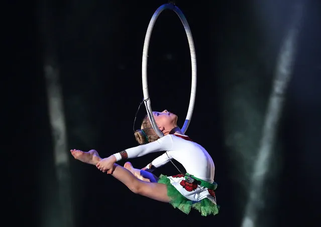 Gymnast Valeria Kurochkina from Yekaterinburg performs during the Circus of Our Childhood festival at the Yekaterinburg Circus in Yekaterinburg, Russia on December 7, 2019. The festival marks the centenary of establishing state circuses in Russia. (Photo by Donat Sorokin/TASS)
