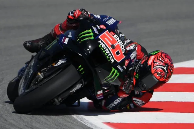 Yamaha French rider Fabio Quartararo takes a curve during the first MotoGP free practice session of the Moto Grand Prix de Catalunya at the Circuit de Catalunya on June 3, 2022 in Montmelo on the outskirts of Barcelona. (Photo by Lluis Gene/AFP Photo)