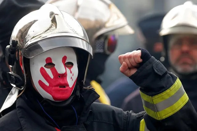 A French firefighter attends a demonstration to protest against working conditions, in Paris, France, January 28, 2020. (Photo by Charles Platiau/Reuters)