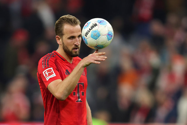 Harry Kane of Bayern Muenchen celebrate with the Ball for his Hattrick after their sides victory and during the Bundesliga match between FC Bayern München and VfB Stuttgart at Allianz Arena on October 19, 2024 in Munich, Germany. (Photo by Christina Pahnke - sampics/Getty Images)