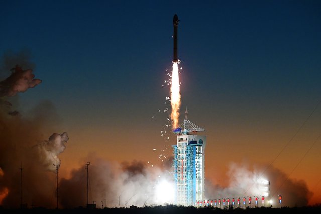 A Long March-2C carrier rocket carrying two satellites blasts off from the Jiuquan Satellite Launch Center in northwest China, 25 November 2024. The rocket blasted off at 7:39 a.m. (Beijing Time) and sent the pair of satellites, Siwei Gaojing-2 03 and Siwei Gaojing-2 04, into the preset orbit. (Photo by Wang Jiangbo/Xinhua News Agency via EPA)