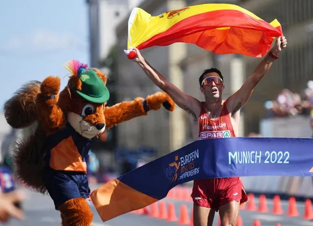 Miguel Ángel López of Spain celebrates as he crosses the line to win gold in the Men's 35km Race Walk during day 6 of the European Championships 2022 at Odeonplatz in Munich, Germany on August 16, 2022. (Photo by Andreas Gebert/Reuters)