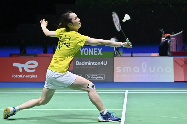 Vu Thi Trang of Vietnam hits a return against Tai Tzu-ying of Taiwan during their women's singles match on day four of the Badminton World Championships in Tokyo on August 25, 2022. (Photo by Richard A. Brooks/AFP Photo)