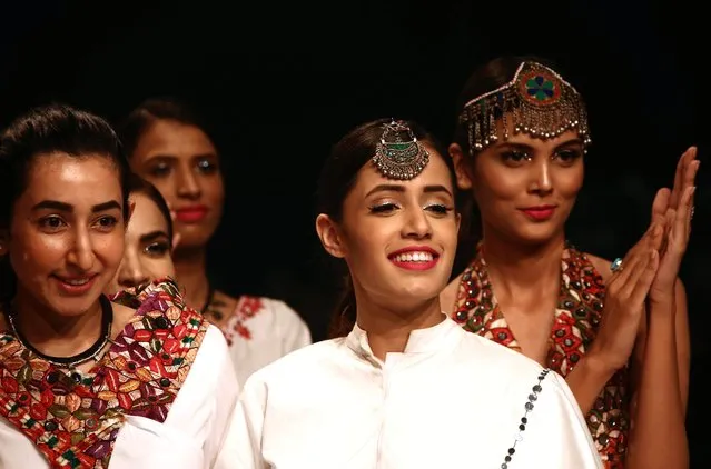 Models present creations by Pakistani designer Amina Aqeel on the 2nd day of the “Made in Pakistan” fashion week in Karachi, Pakistan, 11 November 2017. (Photo by Rehan Khan/EPA/EFE)