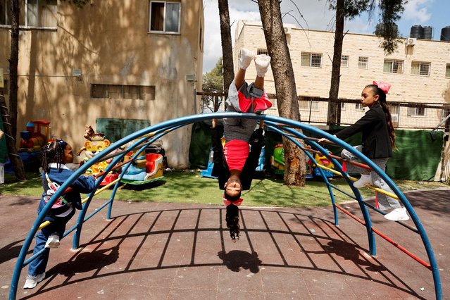 Children play in a playground as Palestinians displaced from the Jenin refugee camp spend Eid al-Fitr away from their homes, amid an ongoing Israeli operation, at a shelter in Jenin, in the Israeli-occupied West Bank, on March 30, 2025. (Photo by Raneen Sawafta/Reuters)