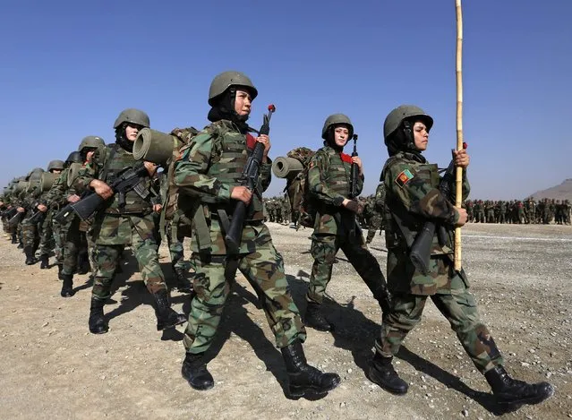 Afghan National Army (ANA) female soldiers take part in a training exercise at the Kabul Military Training Centre (KMTC) in Kabul, October 22, 2014. (Photo by Mohammad Ismail/Reuters)