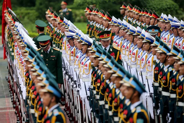 Members of the honor guard prepare for the arrival of France's President Francois Hollande at the Presidential Palace in Hanoi, Vietnam, Tuesday, September 6, 2016. Hollande is on an official visit to Vietnam from Sept. 5-7. (Photo by Minh Hoang/AP Photo)