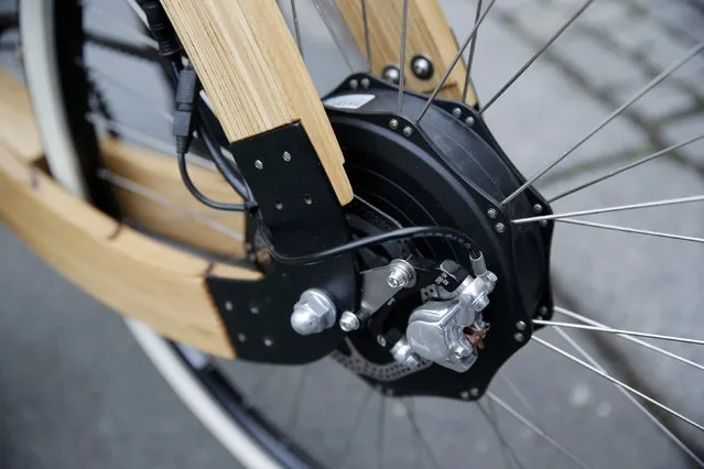 The e-bike motor of the prototyp of a wooden e-bike is pictured in a street in Berlin, November 20, 2014. (Photo by Fabrizio Bensch/Reuters)