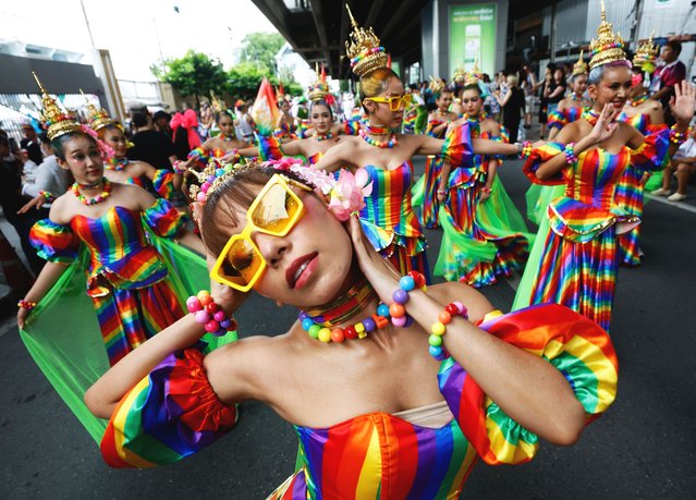 Dancers wearing rainbow costumes take part in the Bangkok Pride Parade 2025 to celebrate Pride Month in Bangkok, Thailand, 01 June 2025. Thousands of Thais and foreigners joined the parade along the main road of a major business district. Pride Month is celebrated worldwide every June to commemorate the 1969 Stonewall uprising and to raise awareness and promote equal rights for the Lesbian, Gay, Bisexual, Transgender, and Queer (LGBTQ) community. (Photo by Narong Sangnak/EPA/EFE)