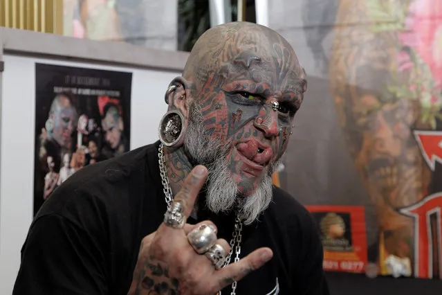 Victor Peralta from Uruguay gestures during the fourth International Tattoo Convention in Quito, September 25, 2016. (Photo by Kevin Granja/Reuters)