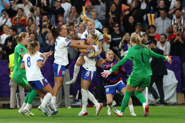 Chloe Kelly of England celebrates with teammates following the team's victory in the penalty shoot out during the UEFA Women's EURO 2025 Final match between England and Spain at St. Jakob-Park on July 27, 2025 in Basel, Switzerland. (Photo by Daniela Porcelli/Getty Images)