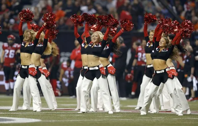 Calgary Stampeders cheerleaders perform during the CFL's 102nd Grey Cup football championship against the Hamilton Tiger Cats in Vancouver, British Columbia, November 30, 2014. (Photo by Todd Korol/Reuters)