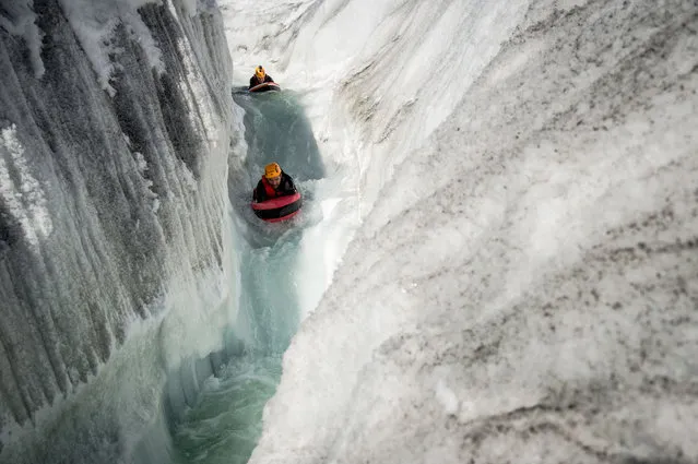 Hydrospeeding through the glacier in Switzerland. (Photo by David Carlier/Caters News)