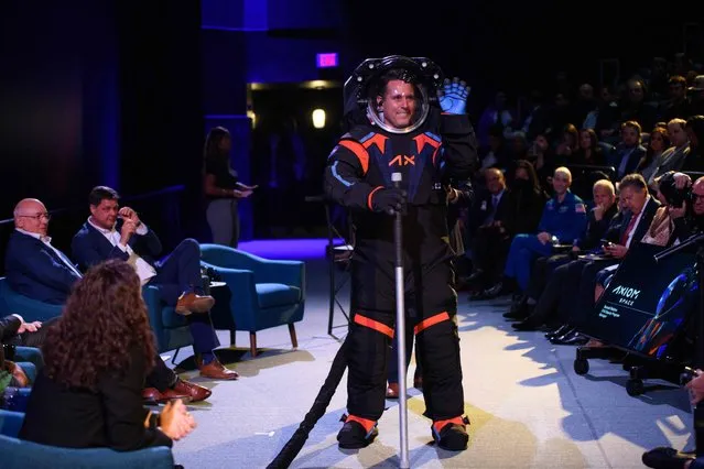 Chief Engineer Jim Stein wears the new spacesuit during the Axiom Space Artemis III Lunar Spacesuit event at Space Center Houston in Houston, Texas, on March 15, 2023. “Since a spacesuit worn on the Moon must be white to reflect heat and protect astronauts from extreme high temperatures, a cover layer is currently being used for display purposes only to conceal the suit’s proprietary design”, Axion said in a press release. (Photo by Mark Felix/AFP Photo)