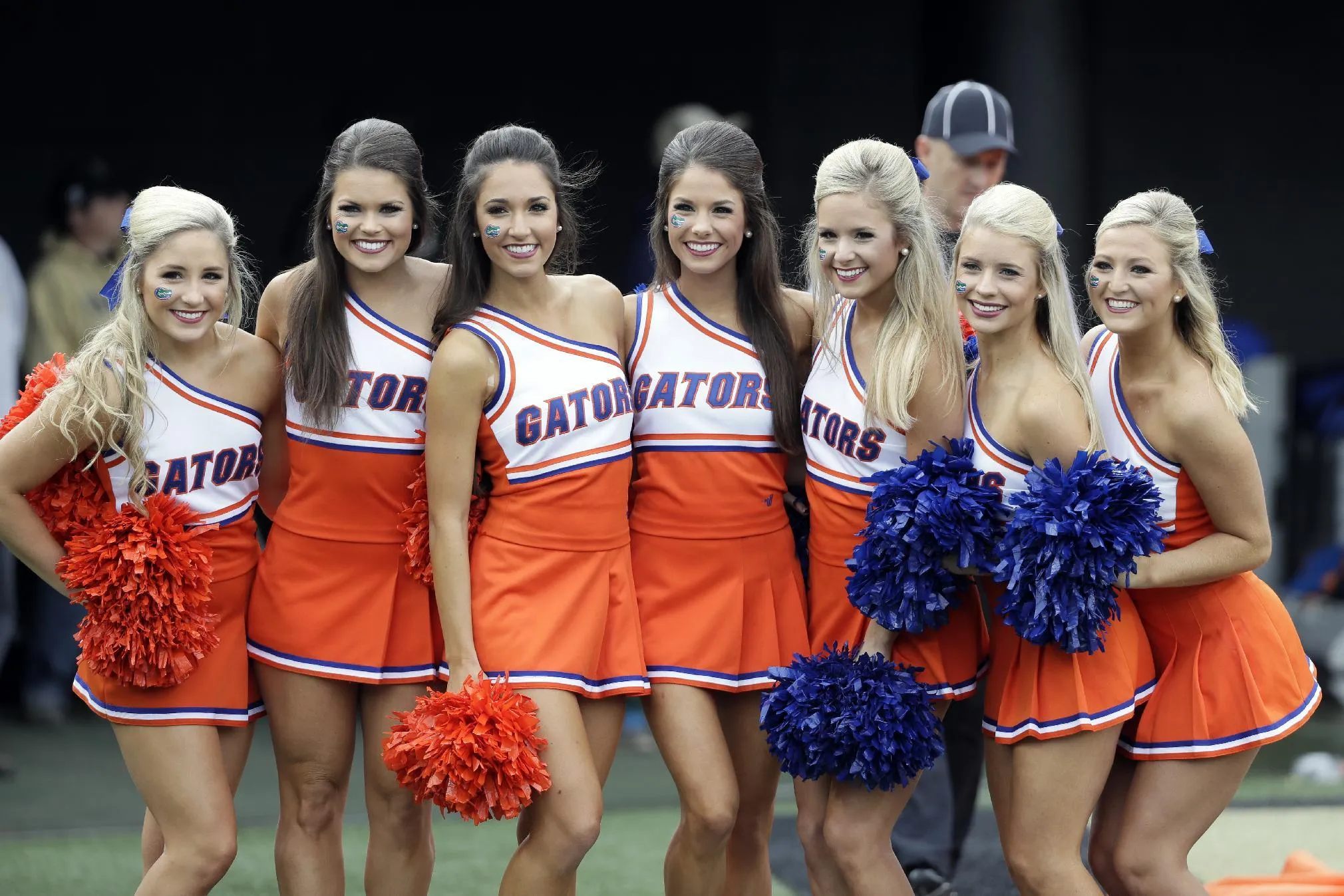 Florida cheerleaders pose before an NCAA college football game between Flor...