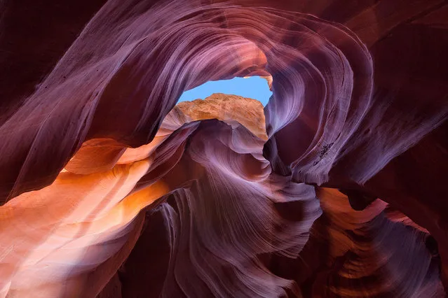 These stunning shots capture the natural wonder hidden deep in the Arizona desert known as The Wave. The 190 million-year-old formation is made of sand dunes which turned to rock through time. They are stacked on top of another and hardened by deposit of calcium salts - causing the vertical and horizontal layers. Hidden somewhere in the Vermillion Cliffs Wilderness Area in Arizona, USA, a special permit is needed to find the spectacular spot. Keen snapper Justin Reznick, 36, captured the breathtaking beauty of the unique landscape on a trip this spring. (Photo by Caters News)