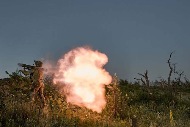 Ukrainian infantry fire at Russian positions on the zero line of the front in prepared trenches 100 meters from the Russian trenches on July 5, 2025 in the direction of Toretsk region, Ukraine. (Photo by Kostiantyn Liberov/Libkos/Getty Images)