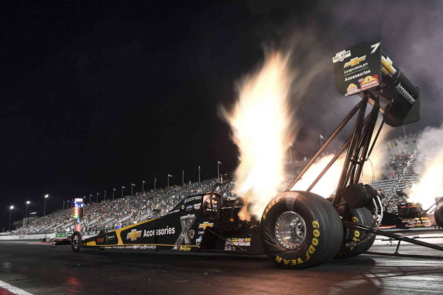 In this photo provided by the NHRA, Top Fuel's Brittany Force takes the provisional No. 1 spot Friday, August 30, 2024, at the annual NHRA U.S. Nationals auto races at Lucas Oil Indianapolis Raceway Park in Indianapolis. (Photo by Marc Gewertz/NHRA via AP Photo)