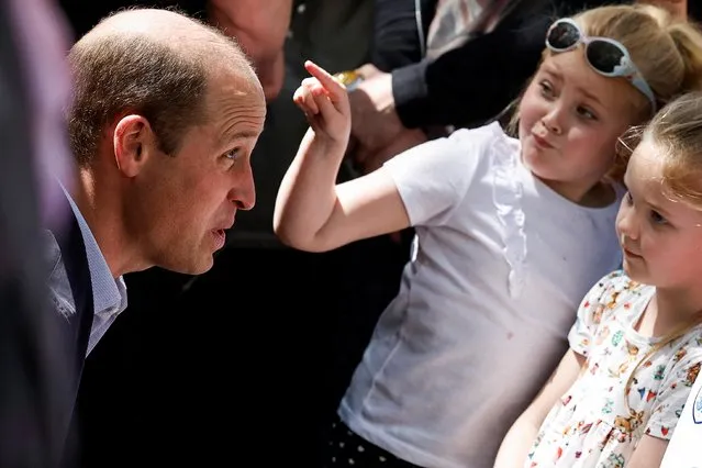 Britain's Prince William greets well-wishers along the Long Walk outside Windsor Castle, Britain on May 7, 2023. (Photo by Clodagh Kilcoyne/Reuters)