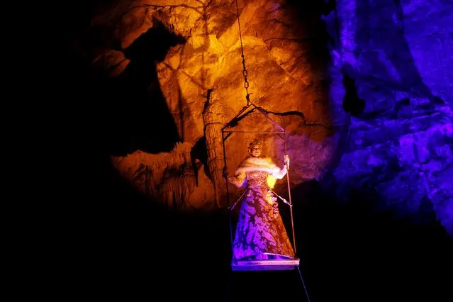 Actor performs the living Nativity biblical scenes in Postojna cave in Postojna, Slovenia, December 22, 2015. (Photo by Srdjan Zivulovic/Reuters)