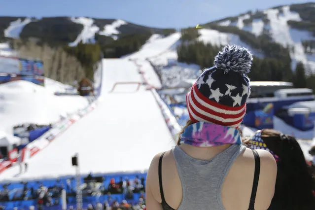 A fan watches during the women's downhill at the alpine skiing world championships on Friday, February 6, 2015, in Beaver Creek, Colo. (Photo by Brennan Linsley/AP Photo)