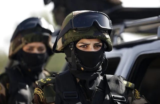 Female members of the Palestinian presidential guard take part in a training session in the West Bank city of Jericho February 10, 2015. (Photo by Mohamad Torokman/Reuters)