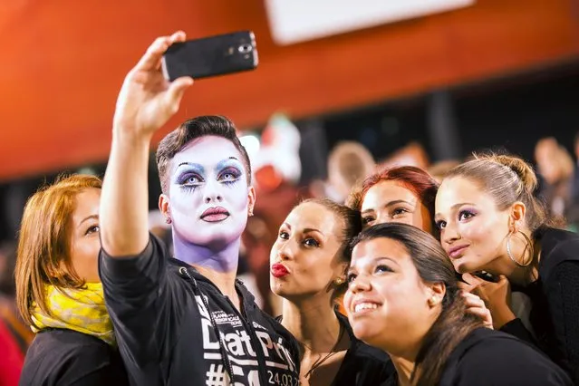 Participants pose for a selfie backstage before a drag queen competition during carnival festivities in Las Palmas on the Spanish Canary Island of Gran Canaria February 20, 2015. (Photo by Borja Suarez/Reuters)