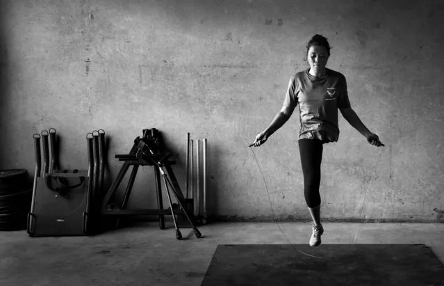 U.S. Air Force wounded warrior, Capt. Sarah Evans, jumps rope in a gym in San Antonio, Texas. Evans was diagnosed with cancer while deployed to Afghanistan and was medically evacuated back to the United States where her leg was amputated. (Photo by Master Sgt. Jeffrey Allen/U.S. Air Force)