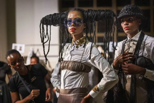 Models get ready backstage for South African designer Gavin Rajah's show during Johannesburg Fashion Week 2023 in Johannesburg, South Africa, Thursday, November 9, 2023. (Photo by Jerome Delay/AP Photo)
