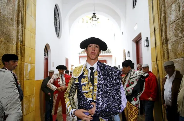 Spanish matador Esau Fernandez waits before the start of a bullfight at The Maestranza bullring in the Andalusian capital of Seville, southern Spain April 15, 2015. (Photo by Marcelo del Pozo/Reuters)